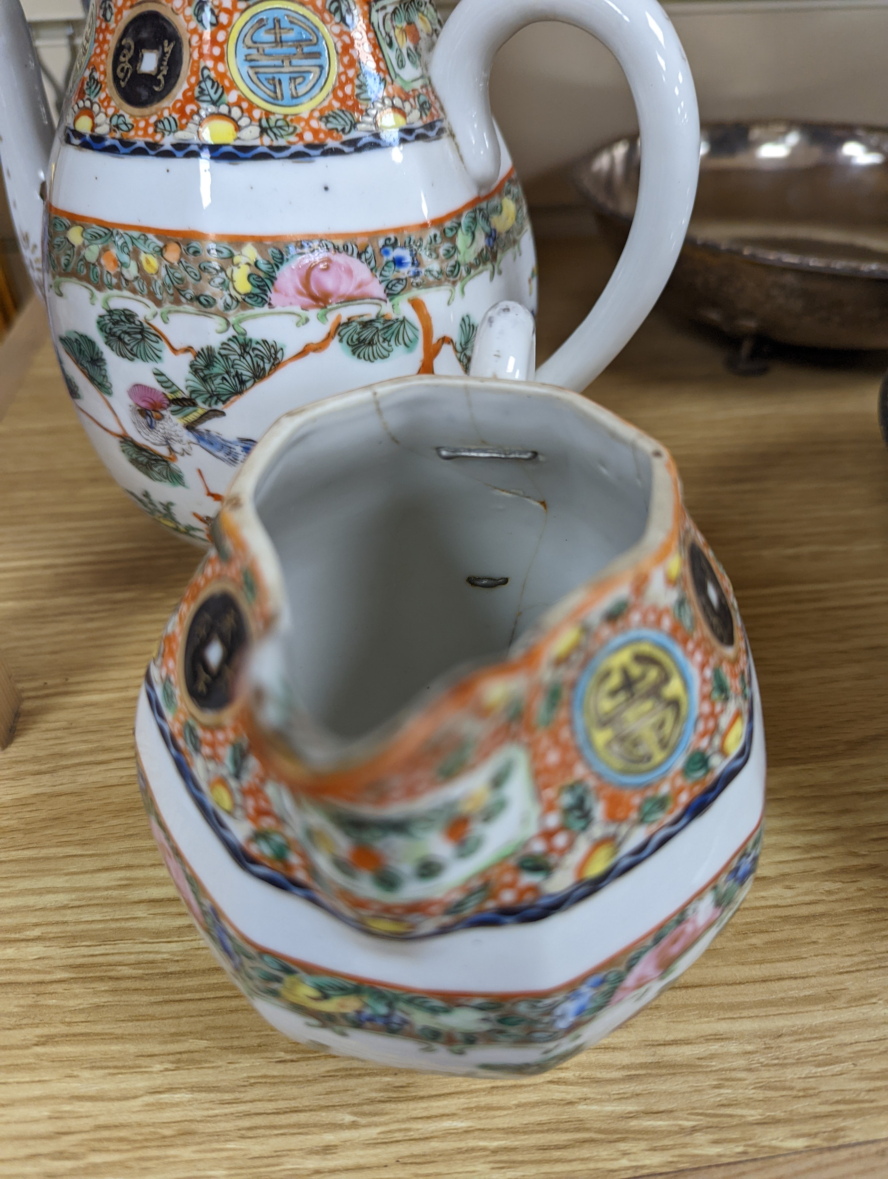 A Chinese celadon glazed vase, 24cm and a Chinese famille rose teapot and matching cream jug, a.f.